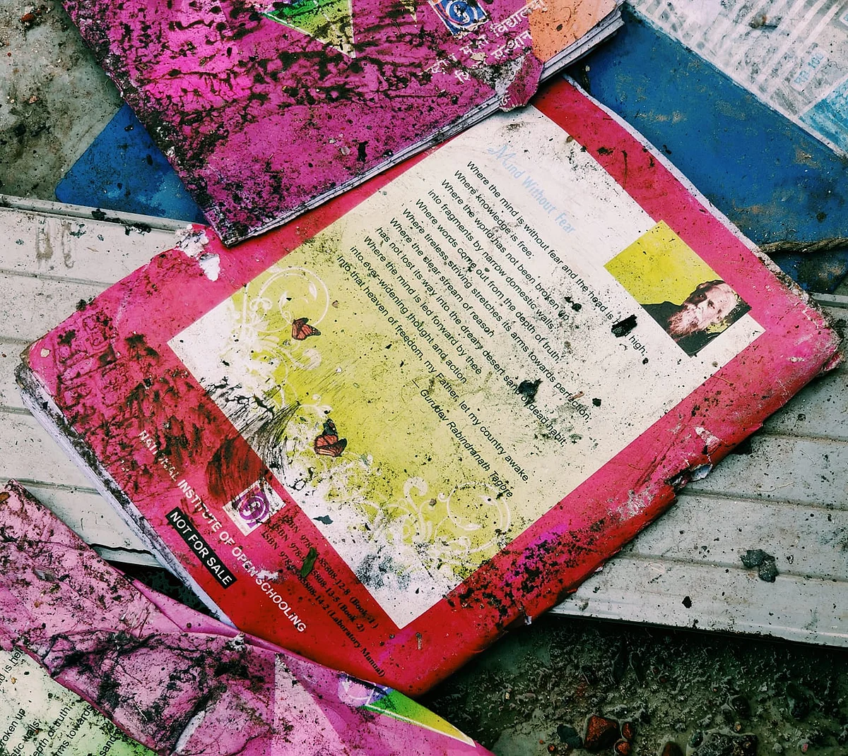 A torn page of Tagore’s poem, “Where the mind is without fear.”