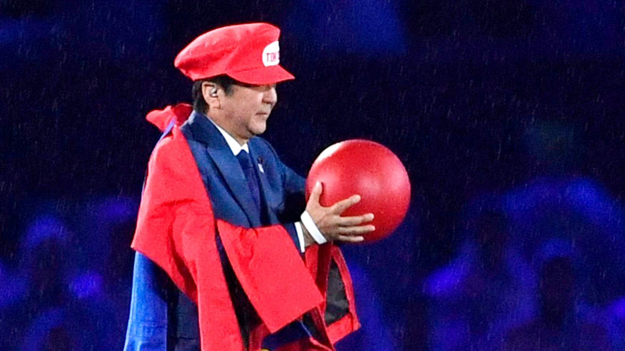 In this Aug. 21, 2016, file photo, Japanese Prime Minister Shinzo Abe appears as the Nintendo game character Super Mario during the closing ceremony at the 2016 Summer Olympics in Rio de Janeiro, Brazil.&nbsp;