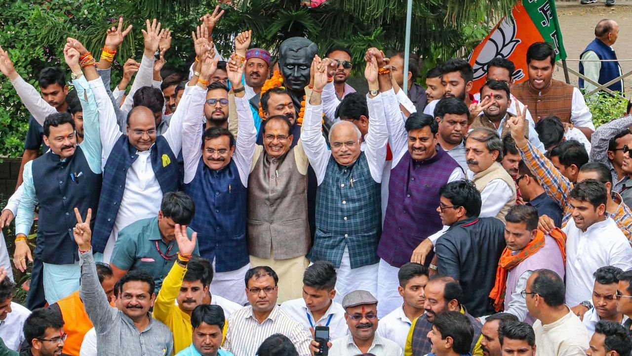 BJP leaders Shivraj Singh Chouhan, VD Sharma, Gopal Bhargava and others celebrate after Madhya Pradesh Chief Minister Kamal Nath resigned from his post.
