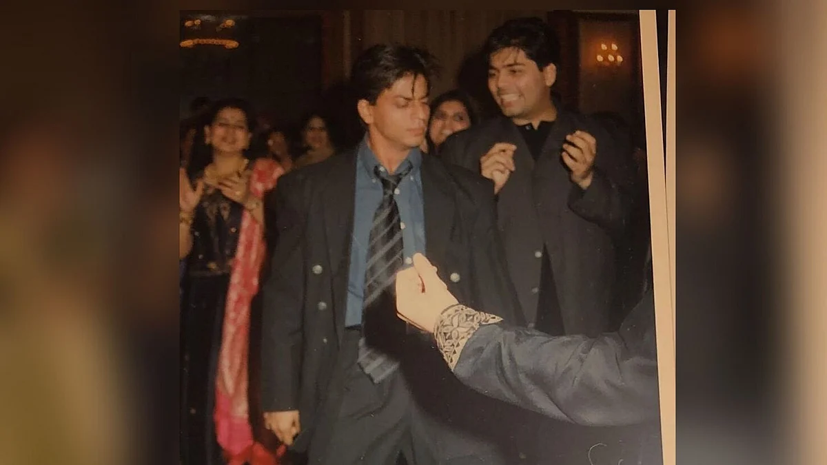 Karan Johar with Shah Rukh Khan at Sanjay Kapoor’s sangeet in 1998.