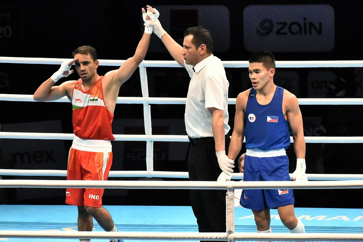 Amit Panghal celebrates qualifying for his first-ever Olympic games.
