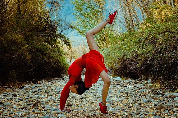 Girl makes a dance move.