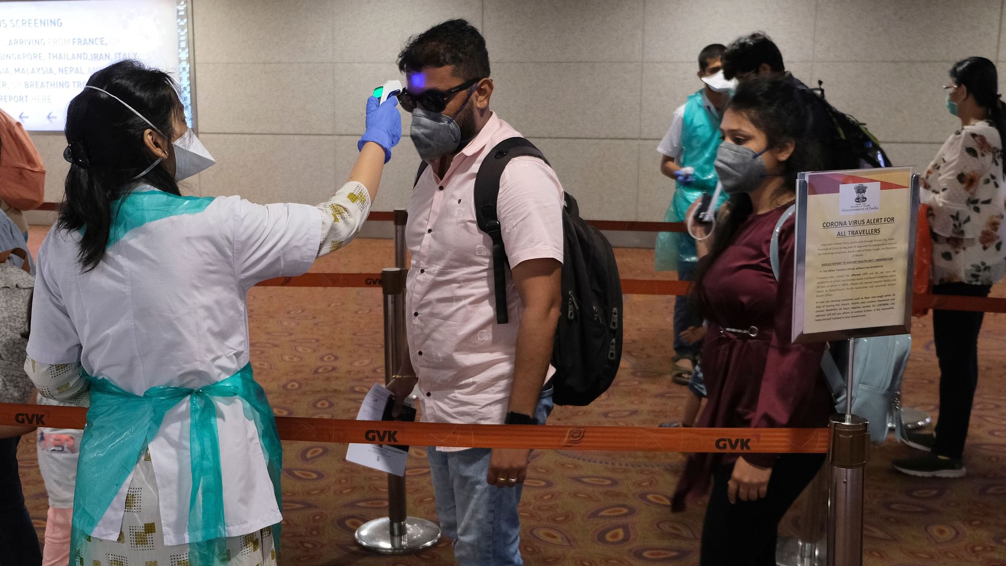File image of passengers undergoing temperature check as a precaution against a new coronavirus at Chhatrapati Shivaji International Airport in Mumbai.
