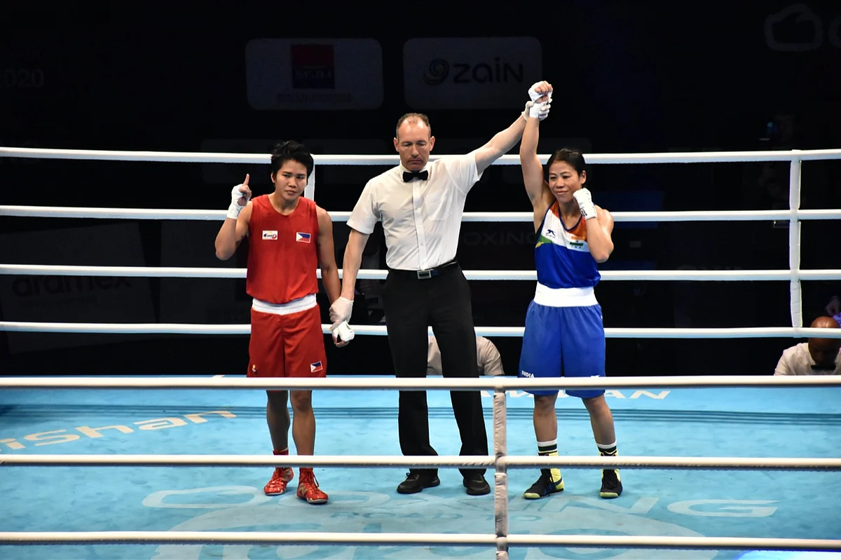 MC Mary Kom celebrates after qualifying for the 2020 Tokyo Olympics.