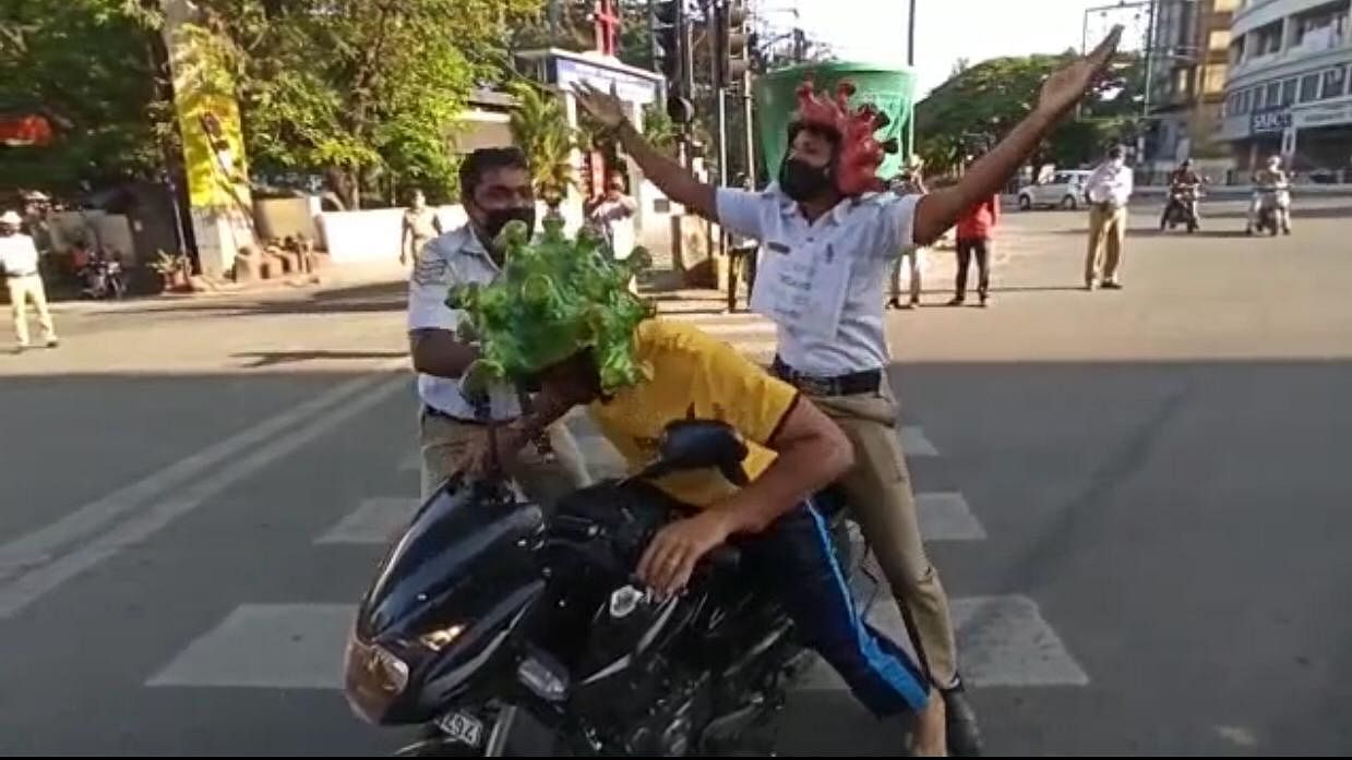Blowing conches, chasing violators with coronavirus-themed helmets and ringing bells - this is how Bengaluru Police raised awareness regarding coronavirus.