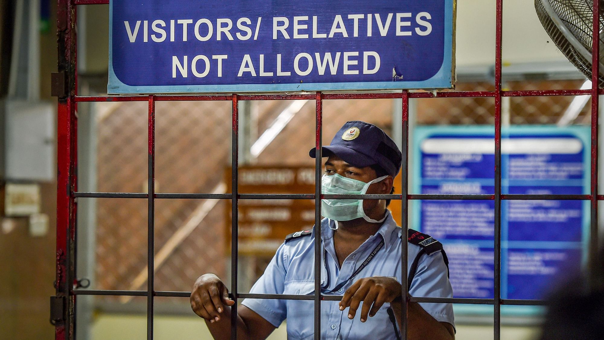 Security personnel wearing mask as preventive measure against the novel coronavirus, at a Chennai hospital on Sunday.