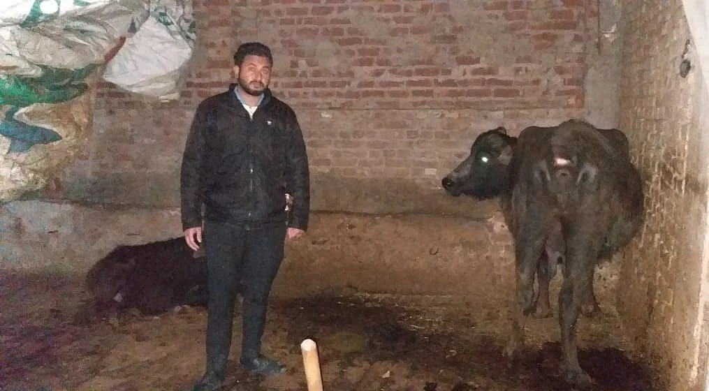 Bikkar sends us a picture of himself from his cattle shed at home. 