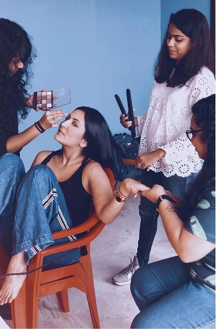 Shenoya in the midst of a hair and make-up session.