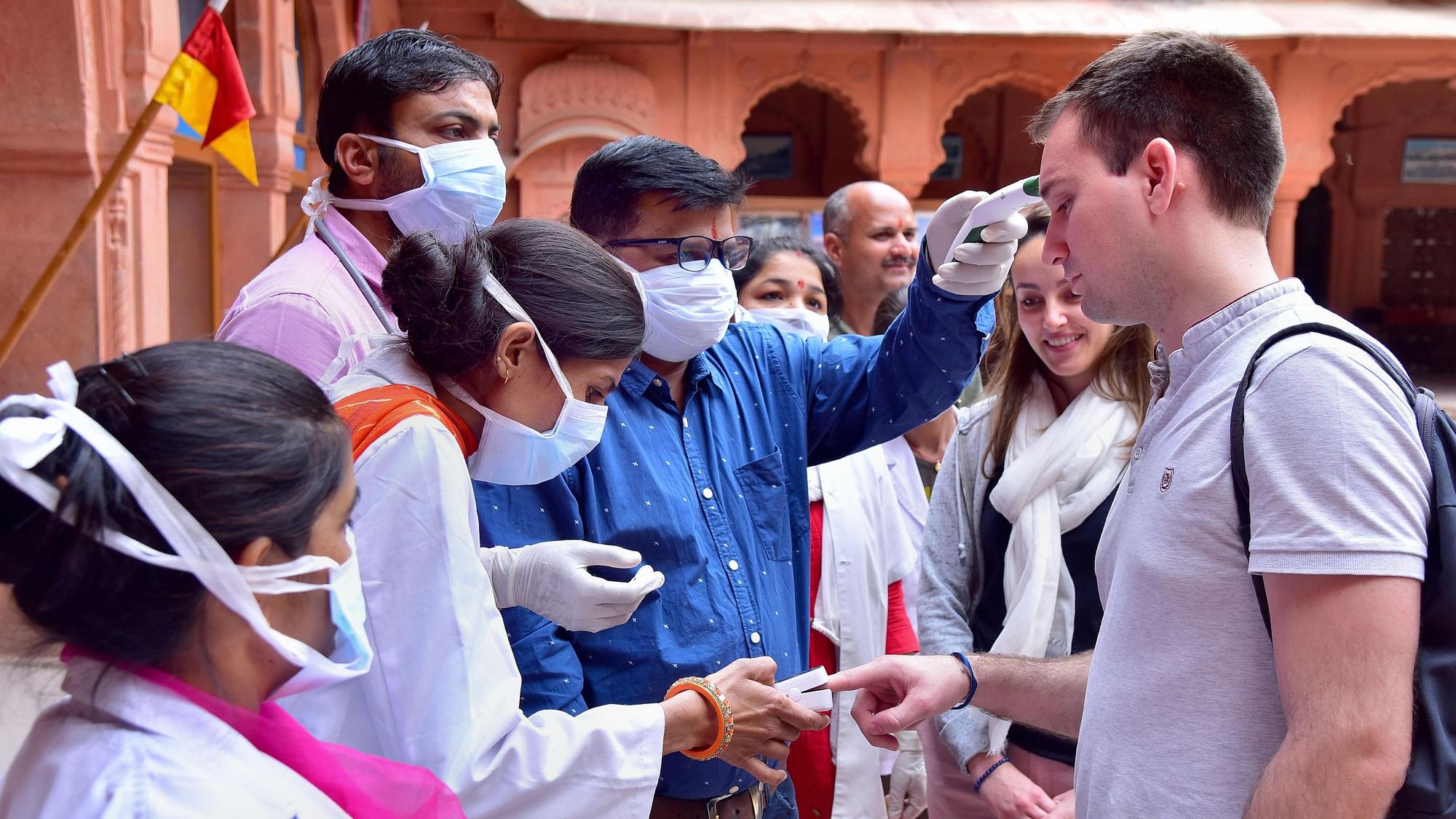 Medical officials check tourists in wake of the deadly coronavirus, at Junagarh fort in Bikaner on Wednesday.