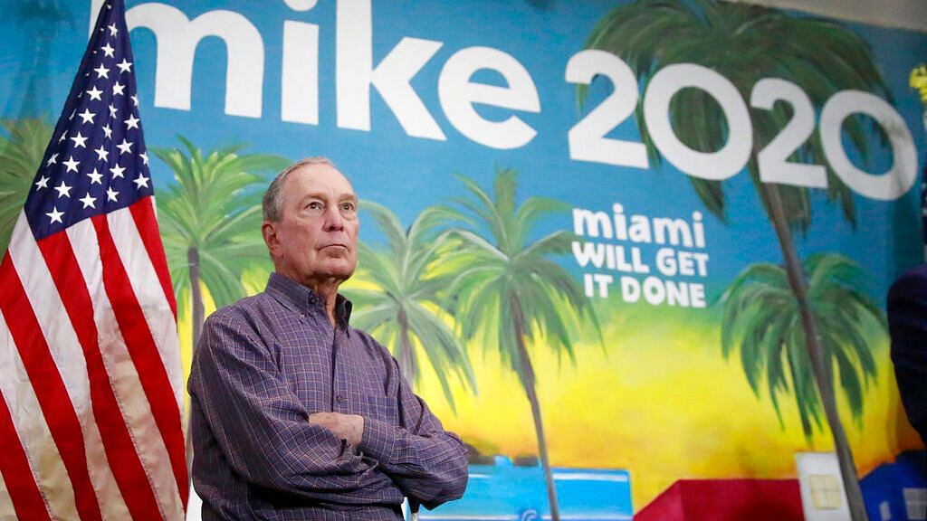 In this 3 March photo, Mike Bloomberg waits to speak at a news conference in the Little Havana neighborhood in Miami. &nbsp;