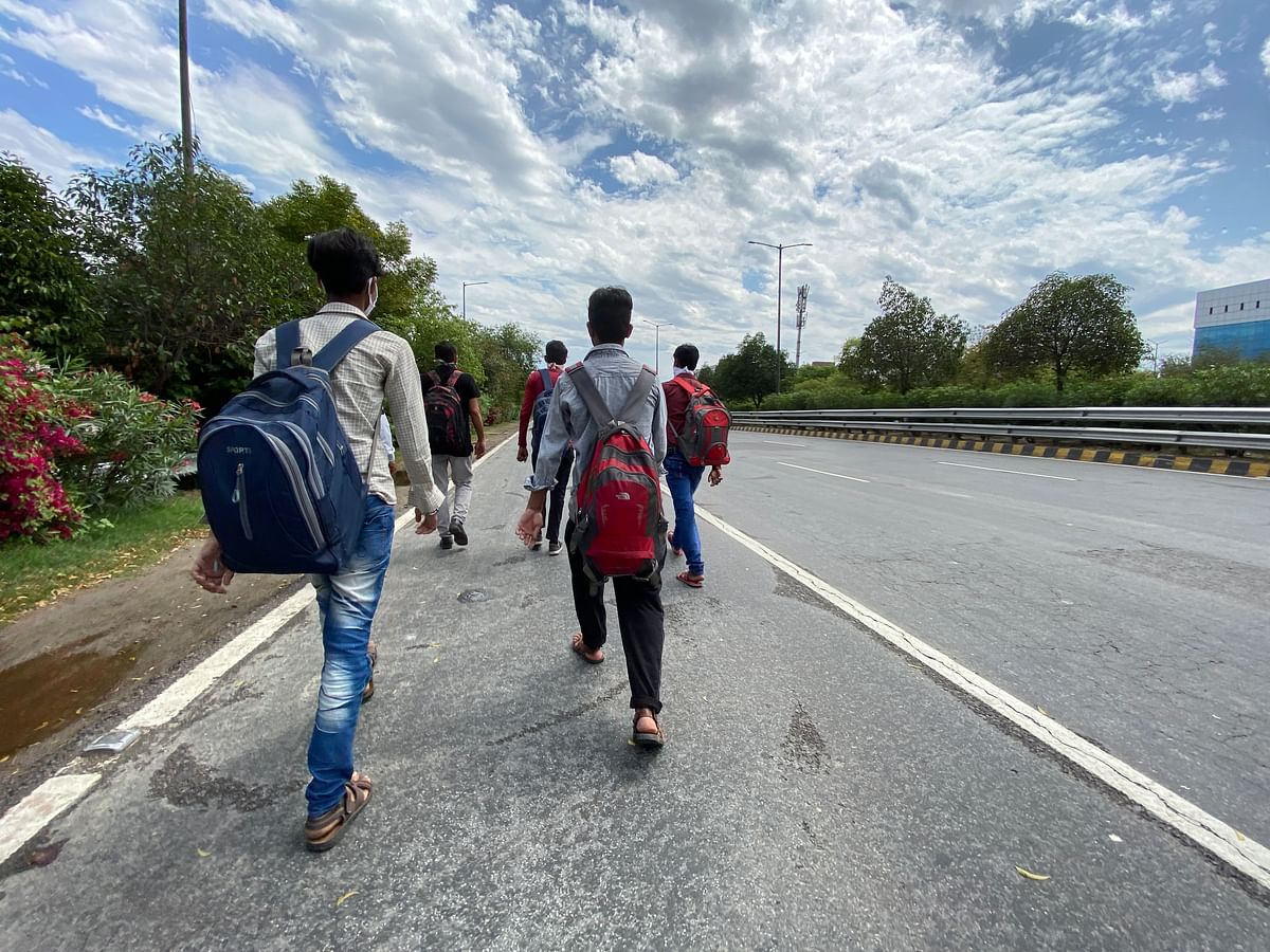 Migrant Labourers walking back home on the Noida Expressway. 