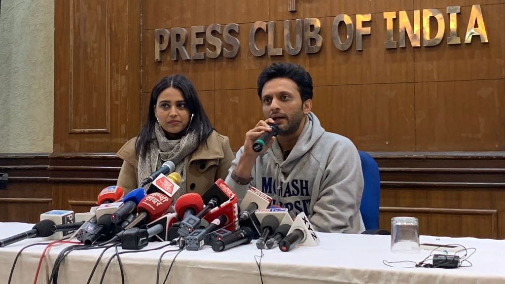 Archival photograph of Swara Bhasker and Mohammed Zeeshan addressing a press conference.