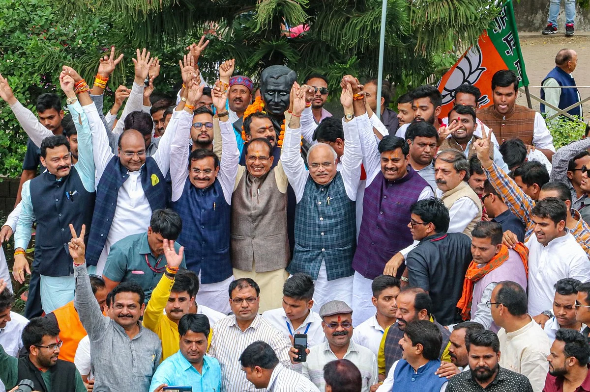Bharatiya Janata Party (BJP) leader Shivraj Singh Chouhan, center, celebrates with party colleagues after Congress party leader Kamal Nath resigned as Chief Minister of India’s central state of Madhya Pradesh in Bhopal, India, Friday, 20 March 2020
