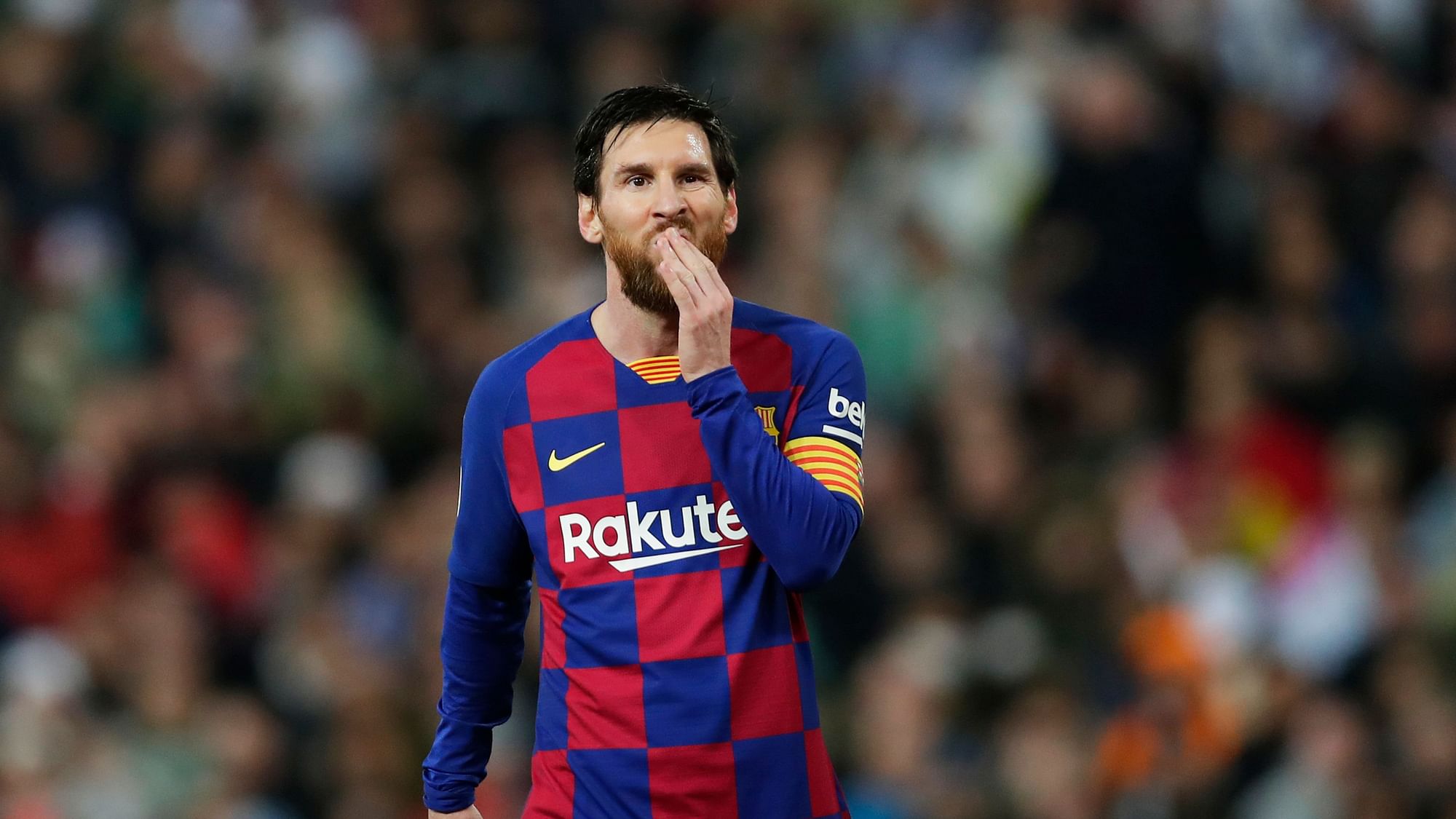 Barcelona’s Lionel Messi reacts during the Spanish La Liga soccer match between Real Madrid and Barcelona at the Santiago Bernabeu stadium in Madrid, Spain.