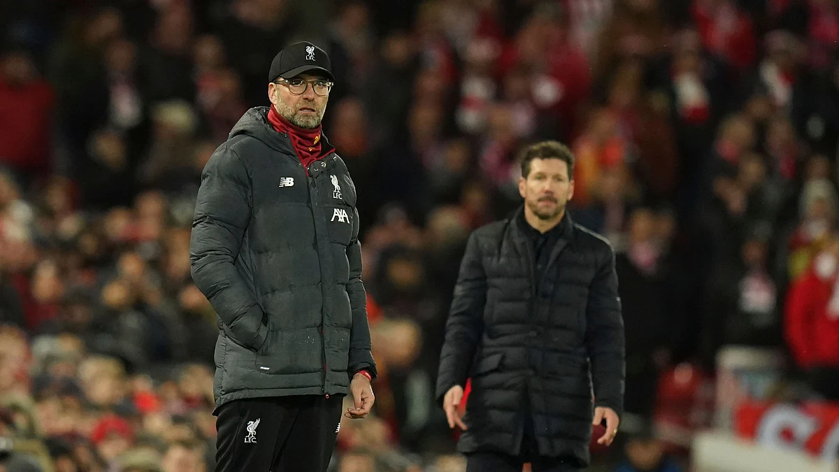 Liverpool’s Jurgen Klopp and Atletico’s Diego Simeone at the sidelines during their match at Anfield stadium in Liverpool on Wednesday.