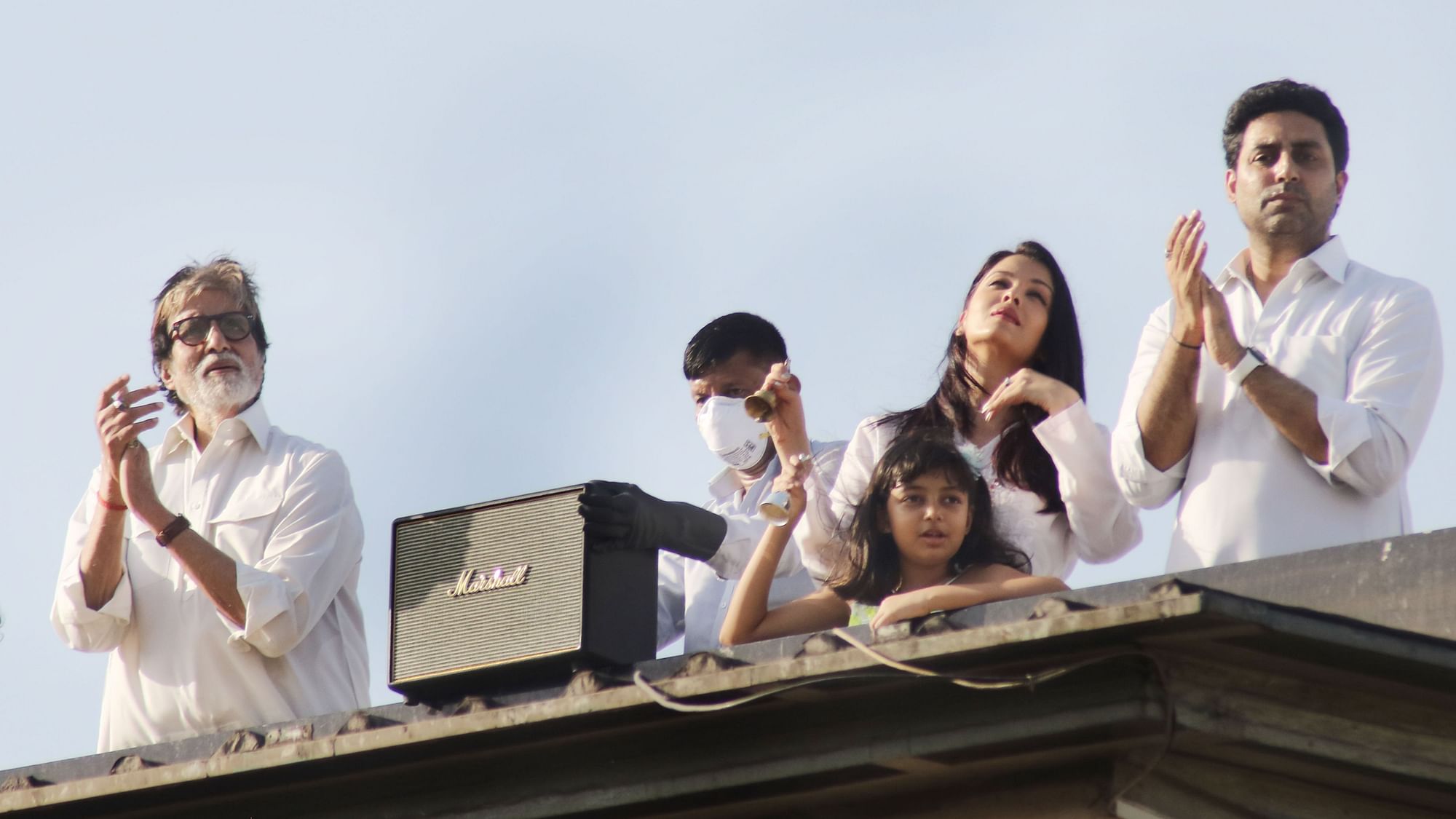 Amitabh Bachchan, Aishwarya Rai, Aaradhya and Abhishek Bachchan on the terrace of their home.