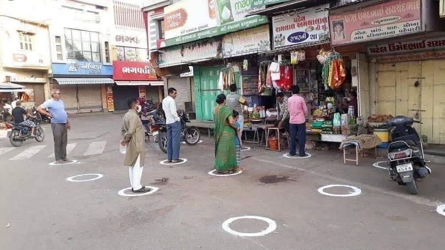 A grocery store in Puducherry drew circles on the road for people, to stand away from each other as they wait in a queue.