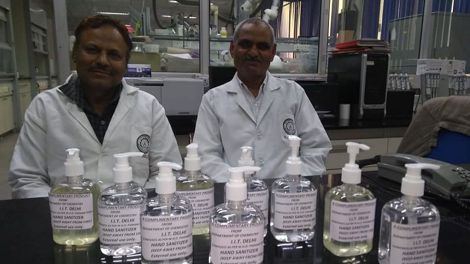 IIT Delhi director with the Chemistry professor who made their own hand sanitiser.