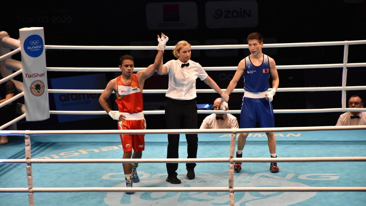 Amit Panghal won his opening bout at the Asian Olympic Qualifiers and now needs just one more win.