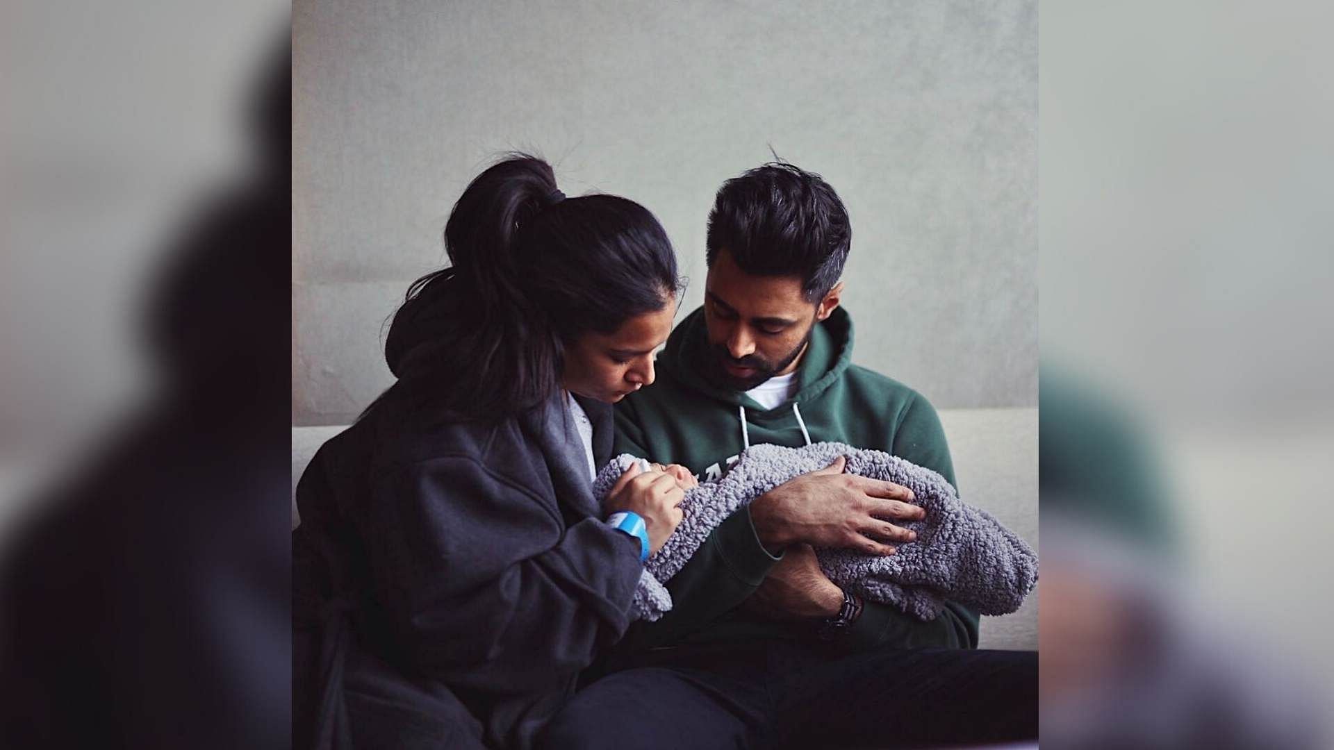 Beena Patel and Hasan Minhaj with their new-born child.&nbsp;