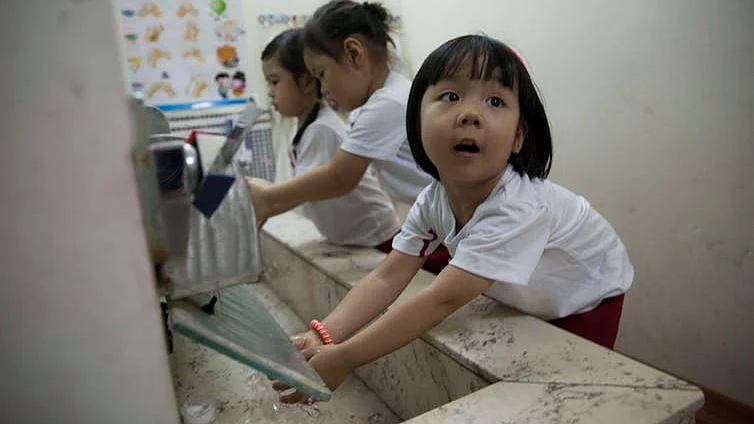 Students washing hands