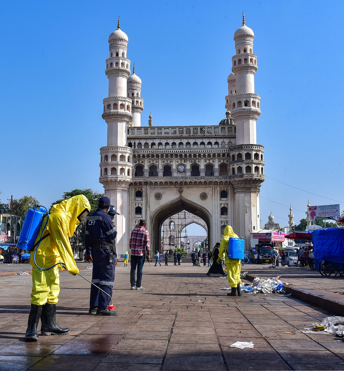 Hyderabad: Workers disinfect an area near the historic Charminar during Janata curfew.