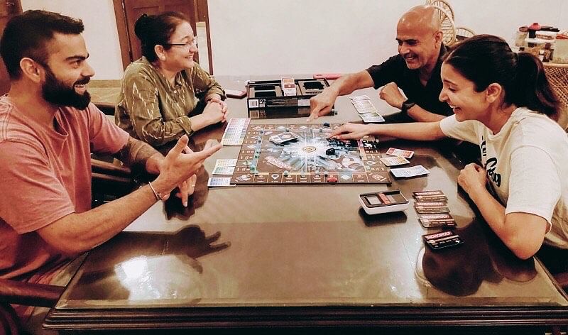 Anushka Sharma posted a picture of Virat and her playing monopoly with her parents a few days ago.