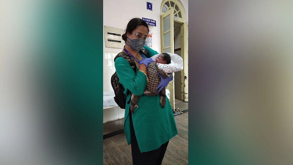 Raji, with the child of the overdue mother.