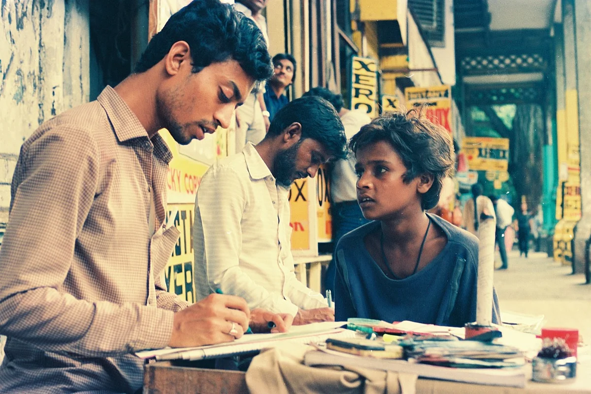 Irrfan Khan as a roadside scribe in <i>Salaam Bombay.</i>