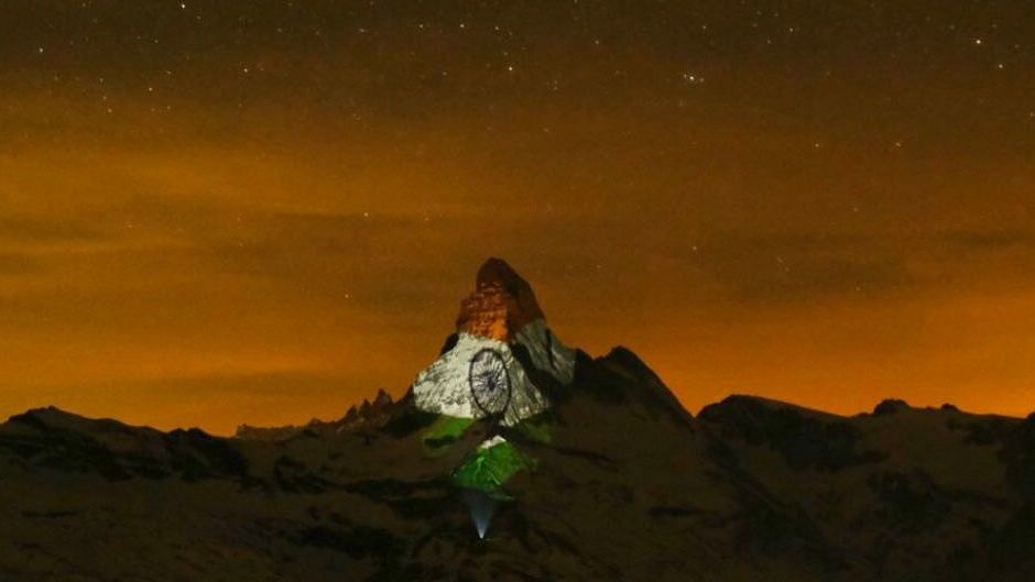 Indian flag projected on a mountain in Switzerland.