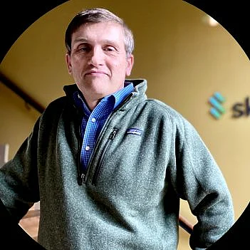 Dr. Andrew Kalman is co-founder and Chief Hub Architect at Skylo. 