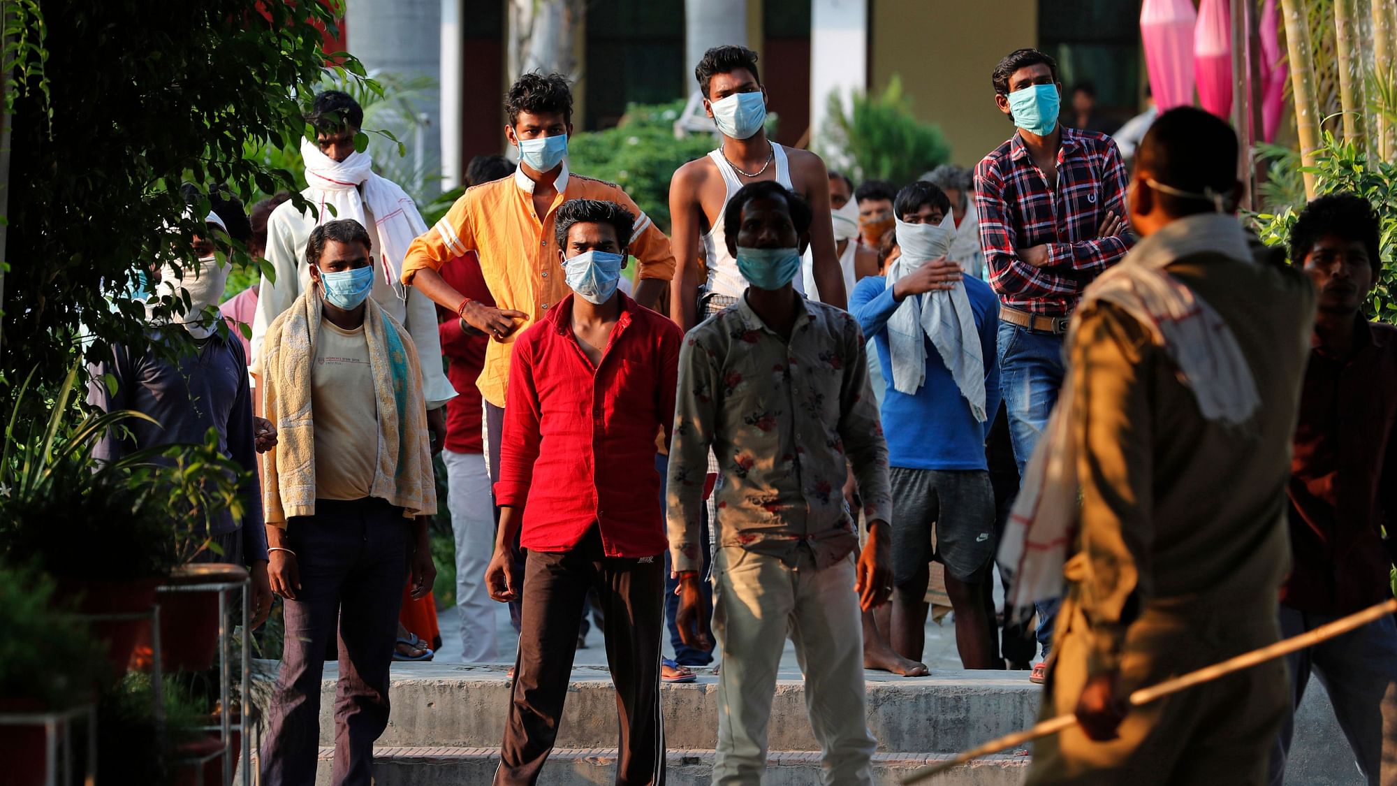 Indian laborers kept in quarantine after arriving from outside the state protest against poor treatment at the quarantine center in Prayagraj.