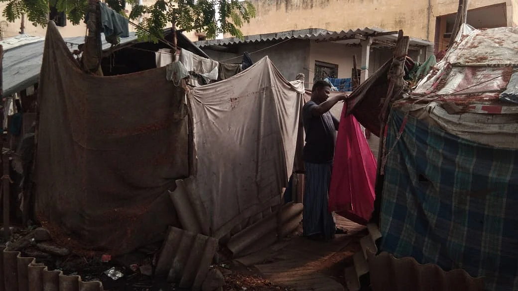 The slum-dwellers live in tents and makeshift houses.