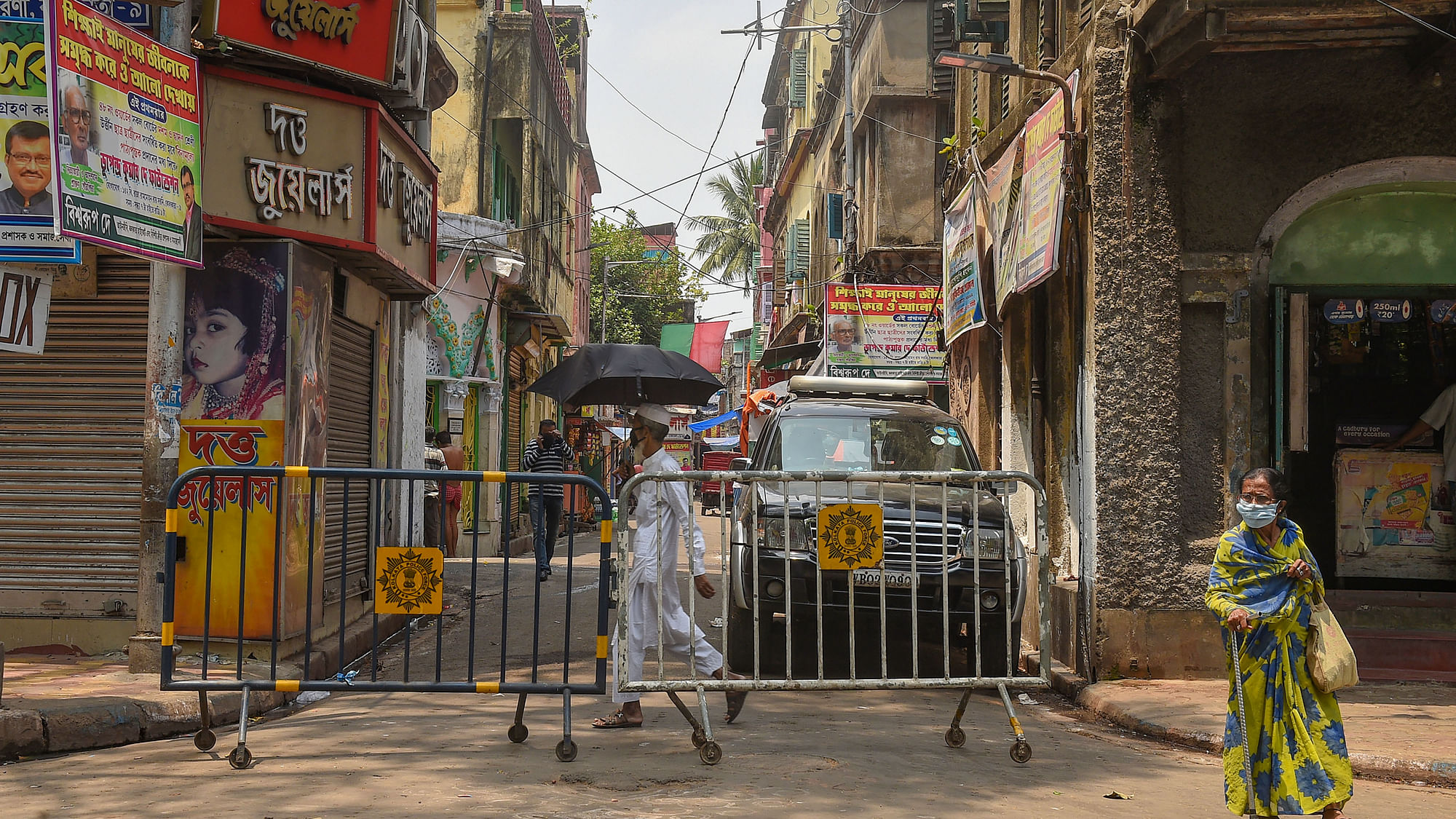 Barricades are seen outside a lane to restrict entry and exit during the nationwide lockdown, imposed in the wake of the novel coronavirus pandemic, in Kolkata.