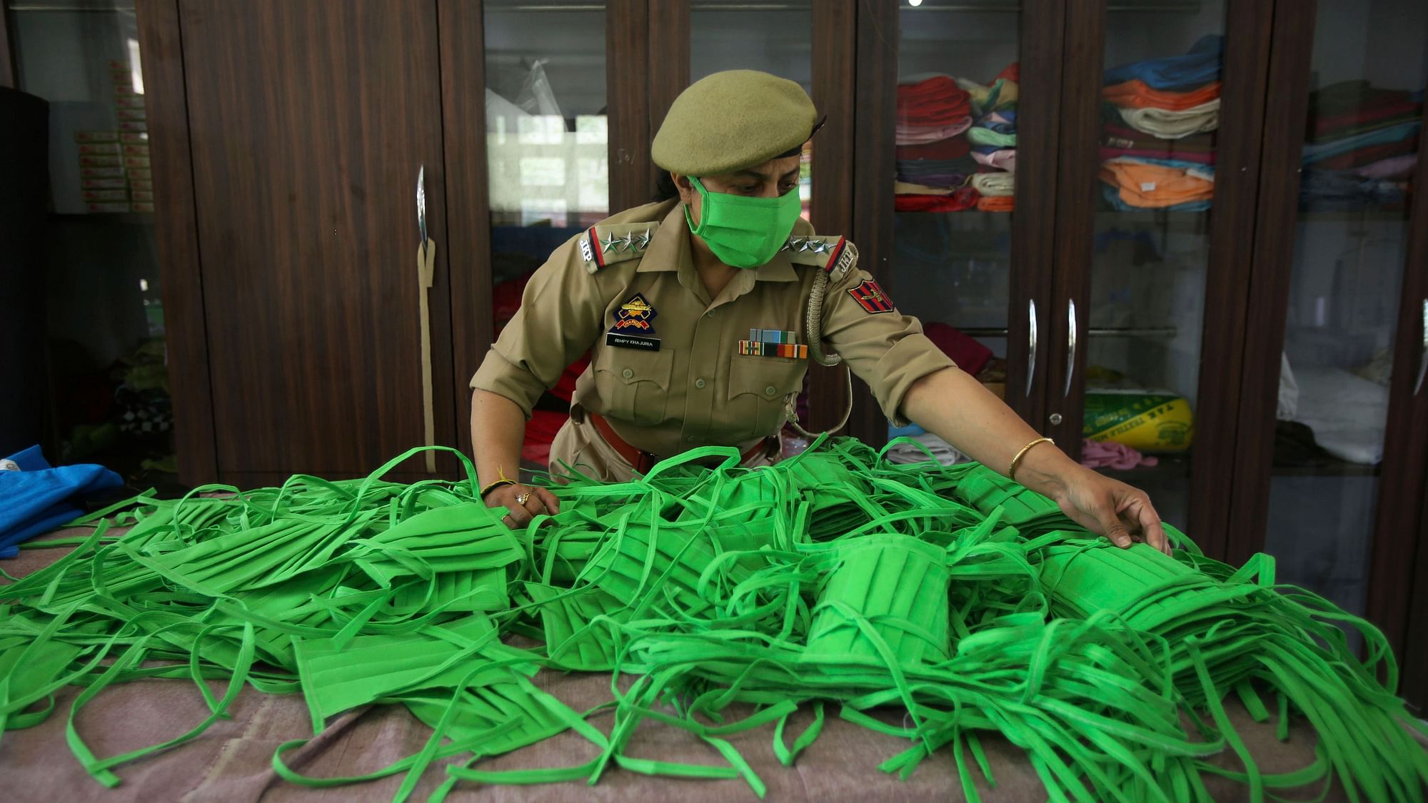 An officer checks the quality as Jammu and Kashmir police personnel make face masks amid COVID-19 outbreak in Jammu. (Image for representation)