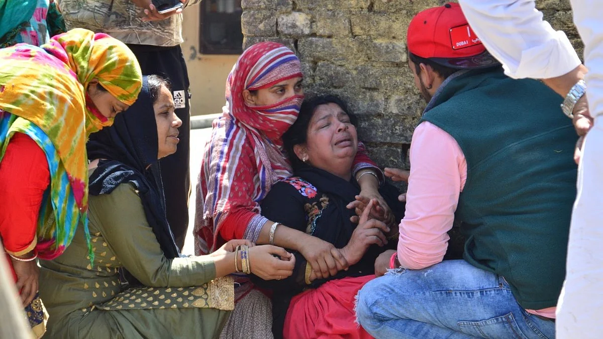 Dilshad’s family members break down at their home in Bangarh village in Himachal’s Una district. 