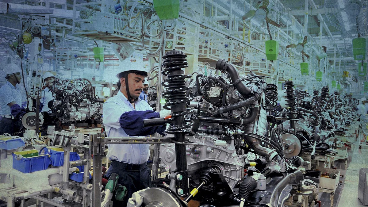 An employee works on Toyota car engines inside the manufacturing plant of Toyota Kirloskar Motor in Bidadi, on the outskirts of Bengaluru, 2015. Image used for representation.