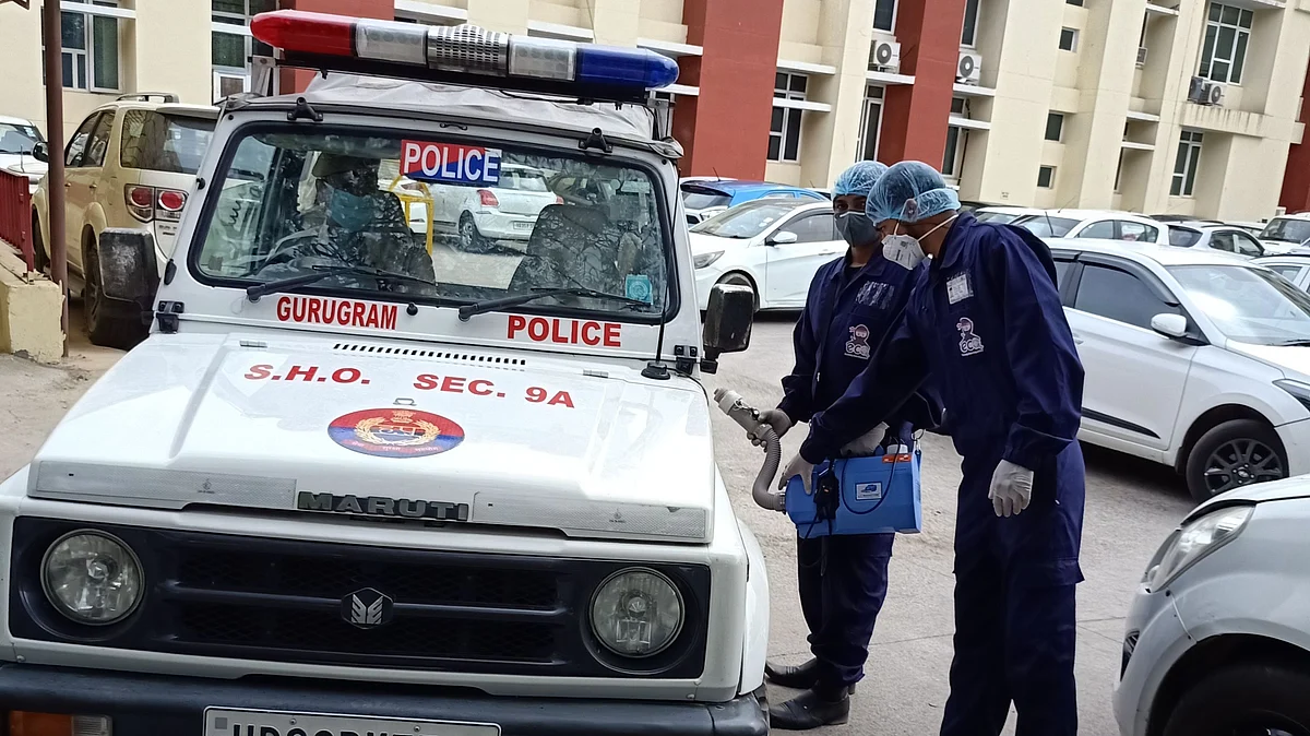 Droom Health team applying its Germ-Shield anti-microbial coating to Gurugram police vehicles. 