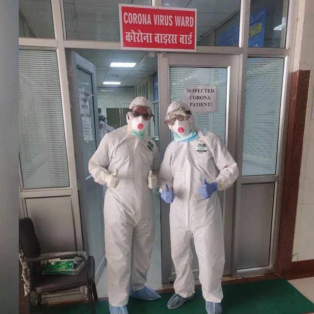 Doctors posing outside the coronavirus ward at KGMU hospital.