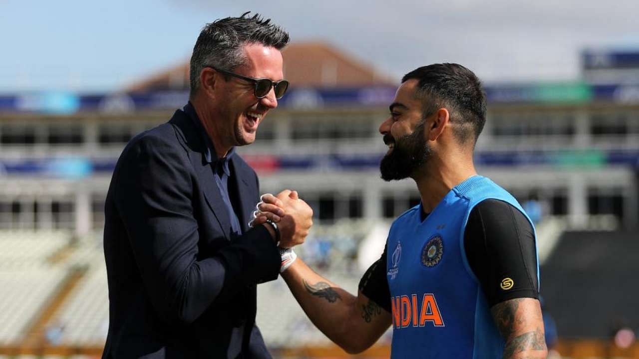 Kevin Pietersen shares a light moment with India captain Virat Kohli.&nbsp;