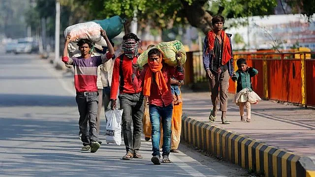 Daily wage labourers walk to return to their villages, Friday, 27 March 2020. Image used for representation.