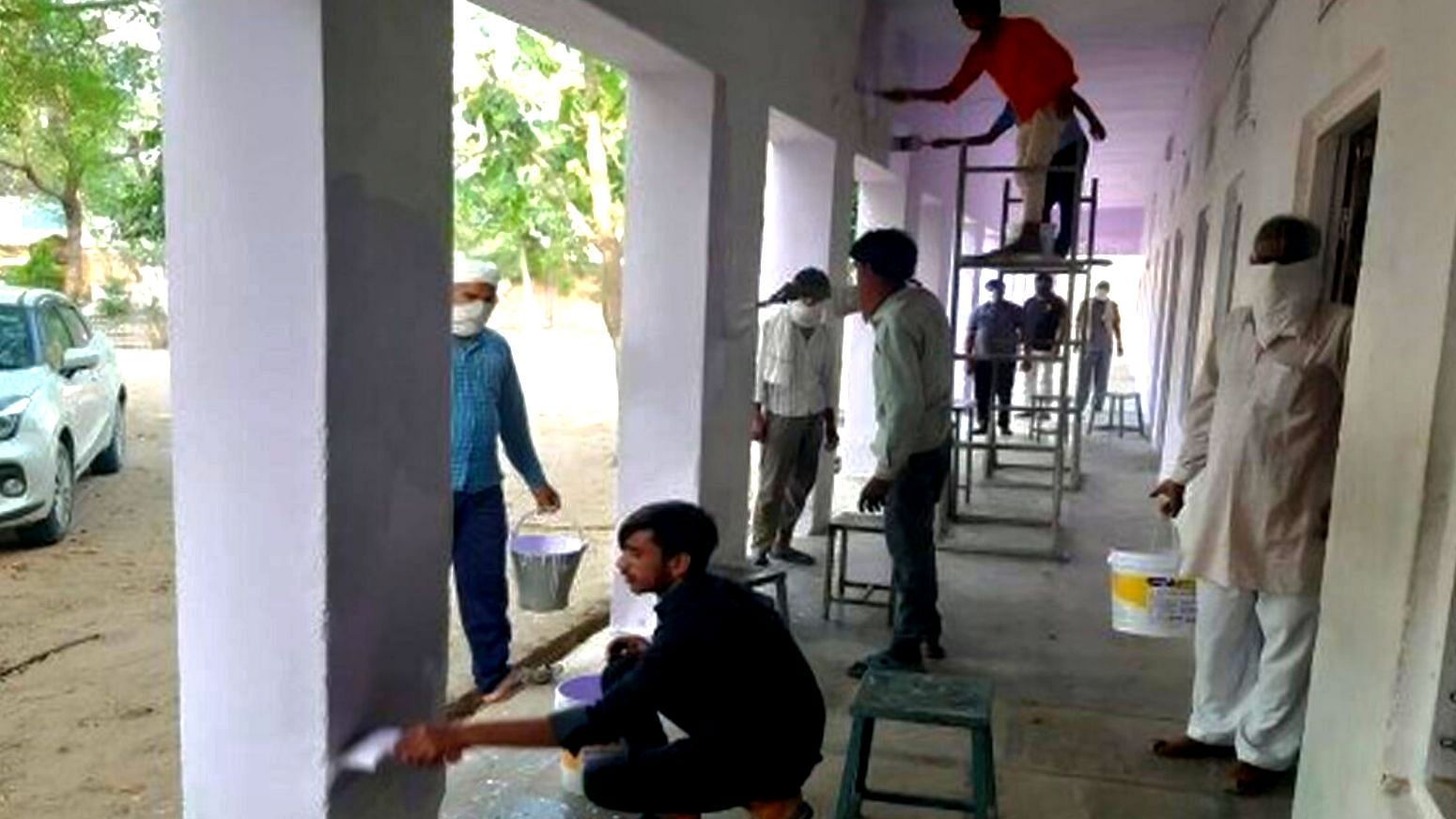 Migrant workers paint a school in Rajasthan’s Sikar