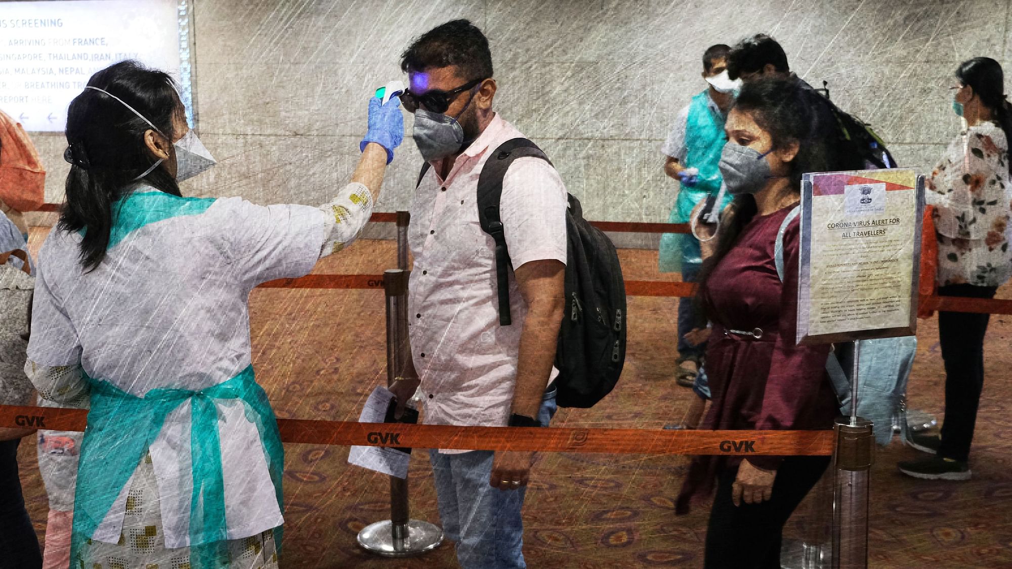 Passengers undergo temperature check as a precaution against a new coronavirus at Chhatrapati Shivaji International Airport in Mumbai. Image used for representational purpose.