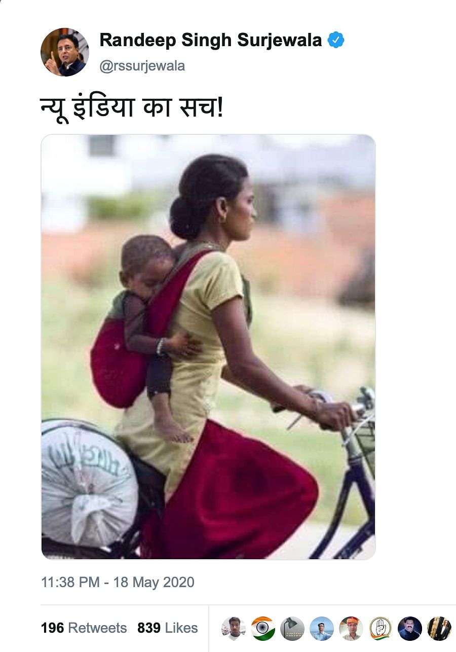 The picture is nearly eight years old and it shows a Nepalese woman carrying her baby on a bicycle.