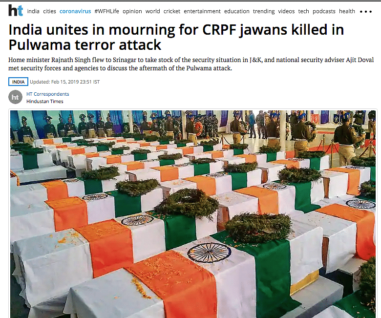 The image shows the coffins of CRPF personnel who lost their lives in the Pulwama attack in February 2019.
