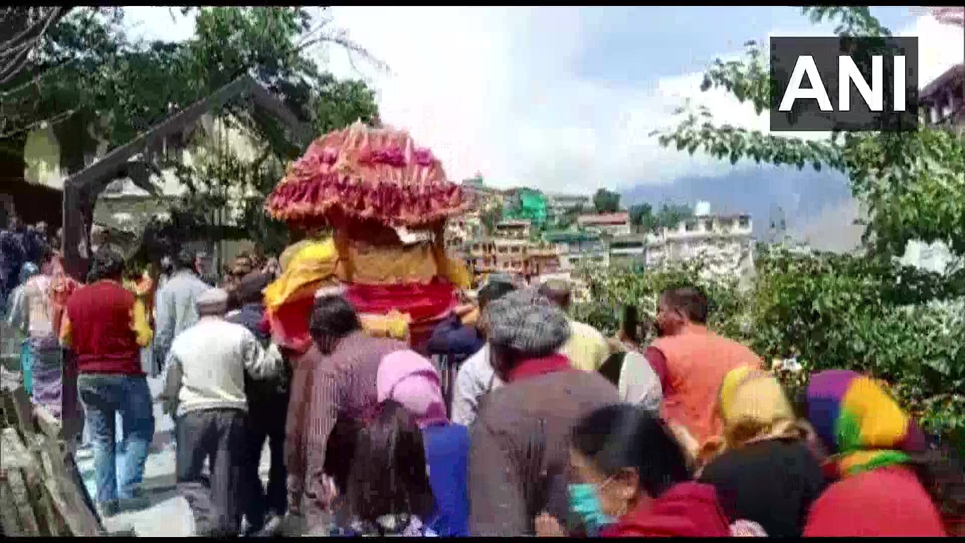 Devotees take out a procession to Badrinath temple, violating lockdown norms.