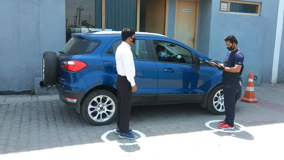 Social distancing norms at car service centres, like this one at Ford, will be the new normal. 