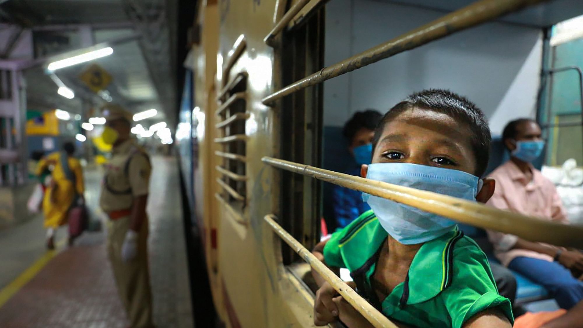 Kochi: Migrants on board a special train for Bhubaneswar to reach their native places, amid ongoing COVID-19 lockdown, at Aluva Station in Kochi, Friday, 1 May 2020.