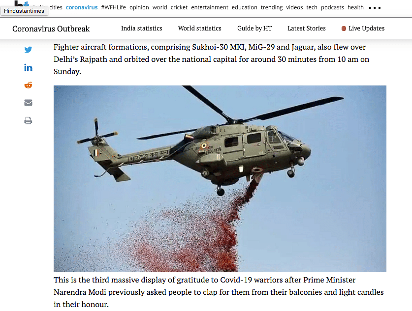A viral image was shared to falsely claim that an IAF helicopter was throwing flower petals on the migrant workers. 