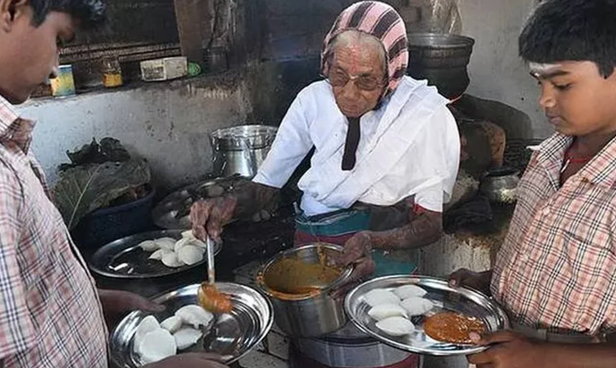 K Kamalathal serves her customers.